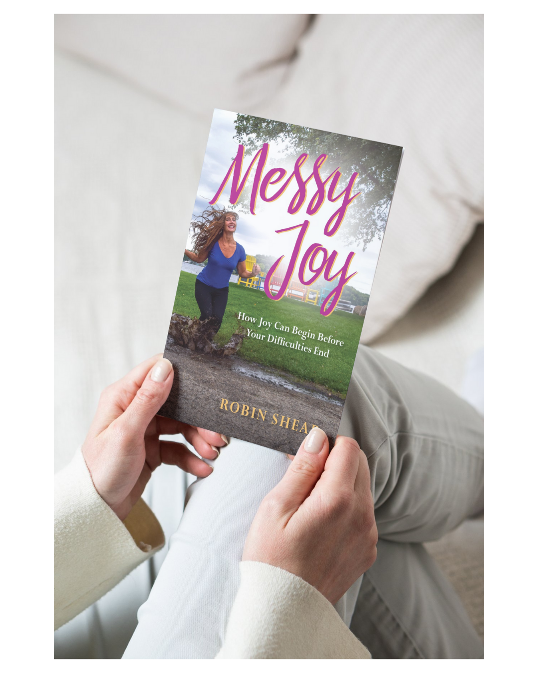 person holding Messy Joy mockup